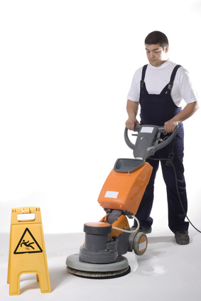 cleaning floor with machine